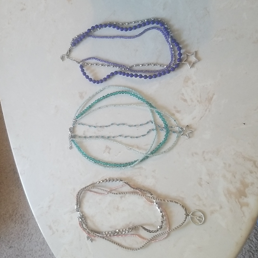 Trio of layered beaded necklaces
